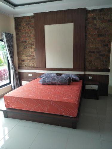 Петумбак: Hotel Rumah Kost Kualanamu