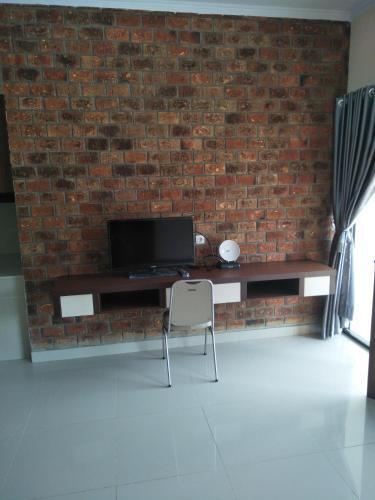 Петумбак: Hotel Rumah Kost Kualanamu