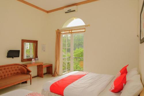Маланг: OYO 414 Loji Rejo Residence