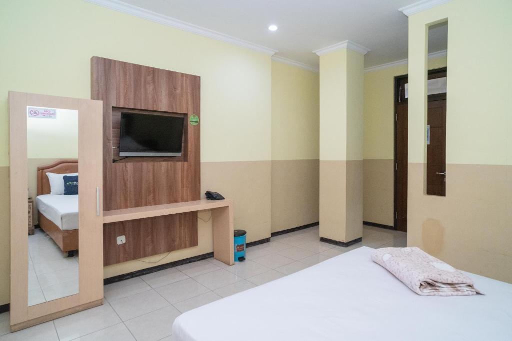 Маланг: Urbanview Hotel de Kopen Malang by RedDoorz