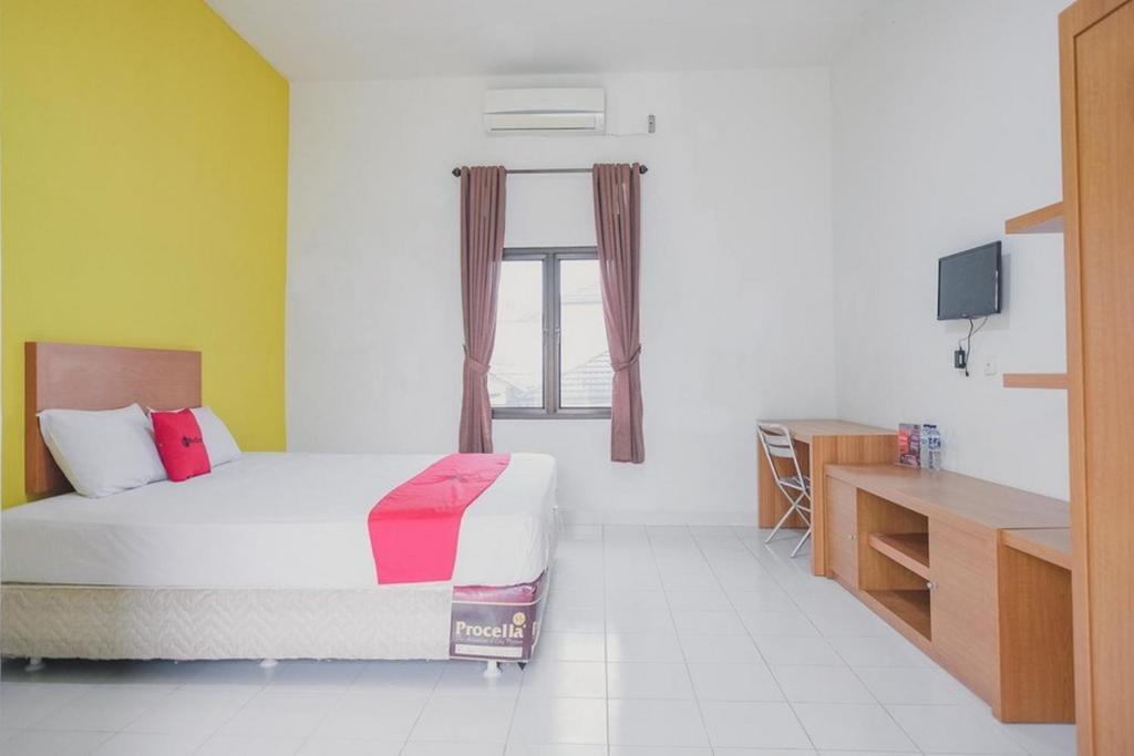 RedDoorz Syariah @ Pasir Putih Jambi — фото 2