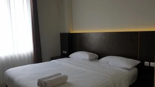 Амбон: Super OYO 1006 Azzahra Guest House Syariah