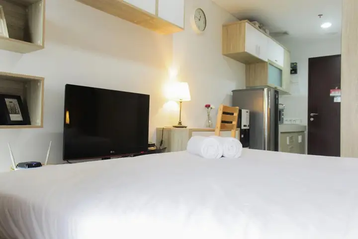 Bright Studio Apartment at Springwood Residence — фото 2