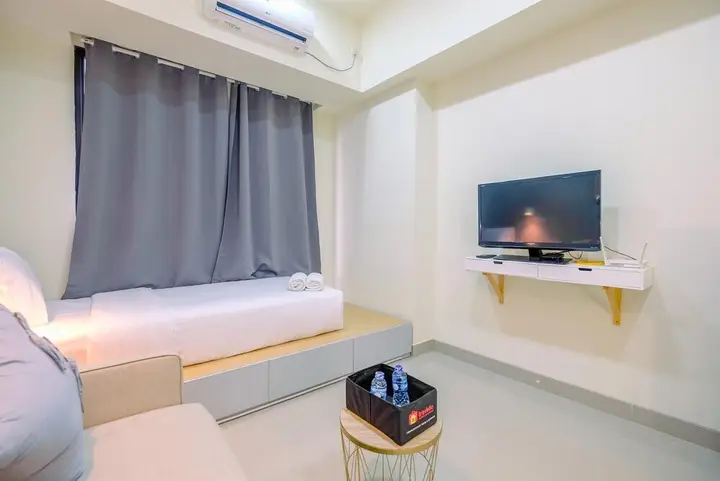 Warm And Cozy Studio Evenciio Apartment Margonda Near Ui — фото 3