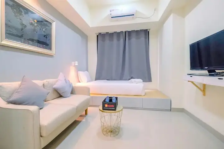 Warm And Cozy Studio Evenciio Apartment Margonda Near Ui — фото 4