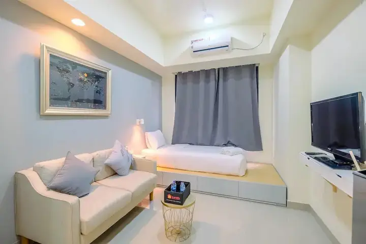 Warm And Cozy Studio Evenciio Apartment Margonda Near Ui — фото 5