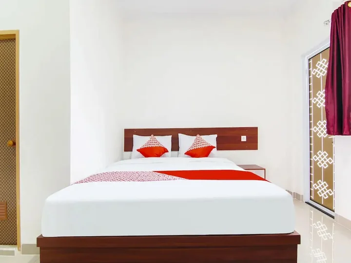Дюмай: OYO 91301 Lewis Dc Guesthouse