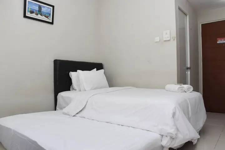 Homey And Tidy Studio Taman Melati Margonda Apartment Near Campus — фото 3