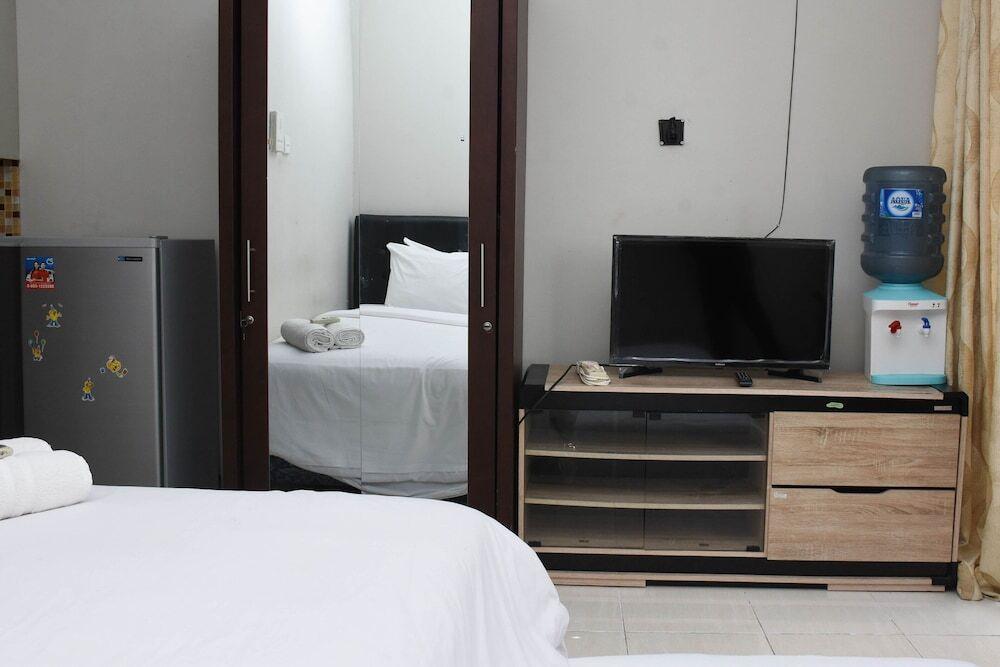 Homey And Tidy Studio Taman Melati Margonda Apartment Near Campus — фото 4