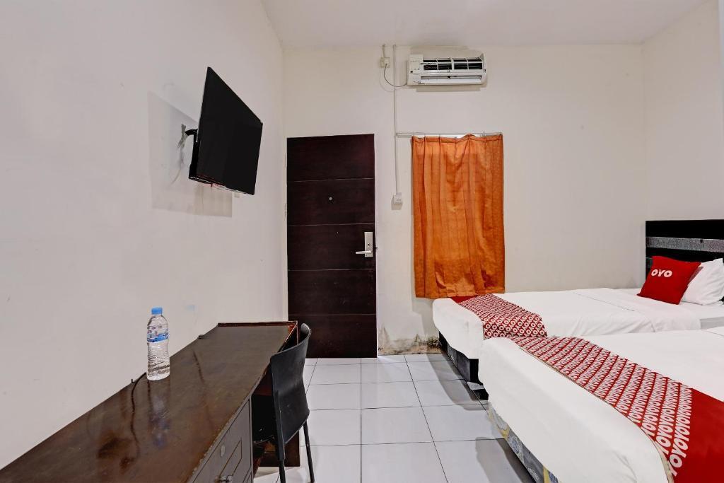 Самаринда: OYO 91861 Pemuda Kemuning Guest House