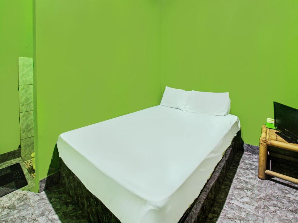 Прайя: OYO 92149 Ashooy HomestayNearWisata Desa sedau
