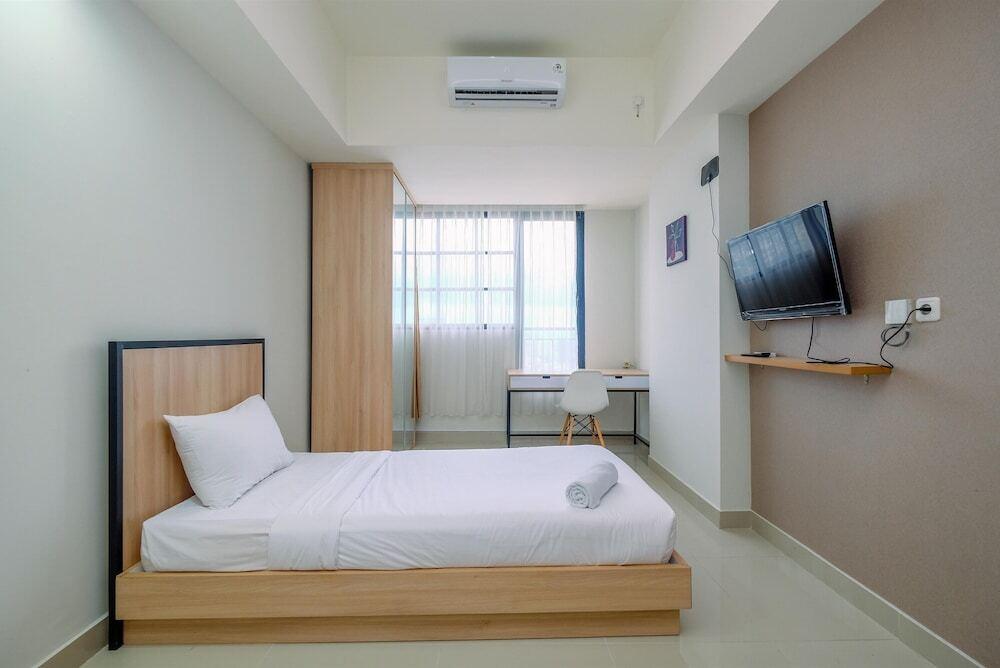 Minimalist Studio Room At Evenciio Margonda Apartment — фото 3