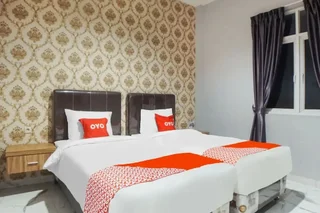 Медан: SUPER OYO Capital O 92066 Papakoel Hotel & Cafe