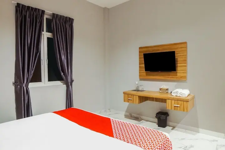 Медан: SUPER OYO Capital O 92066 Papakoel Hotel & Cafe