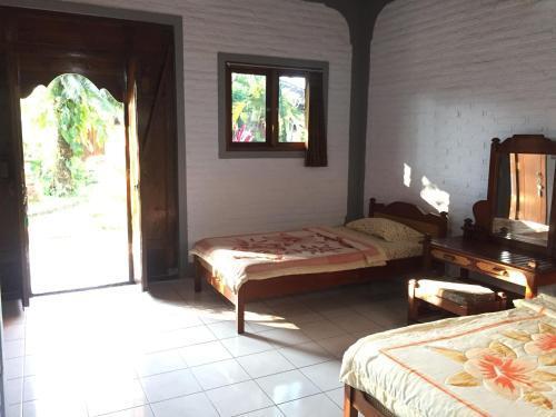 Puri Manik Sari Cottages — фото 6