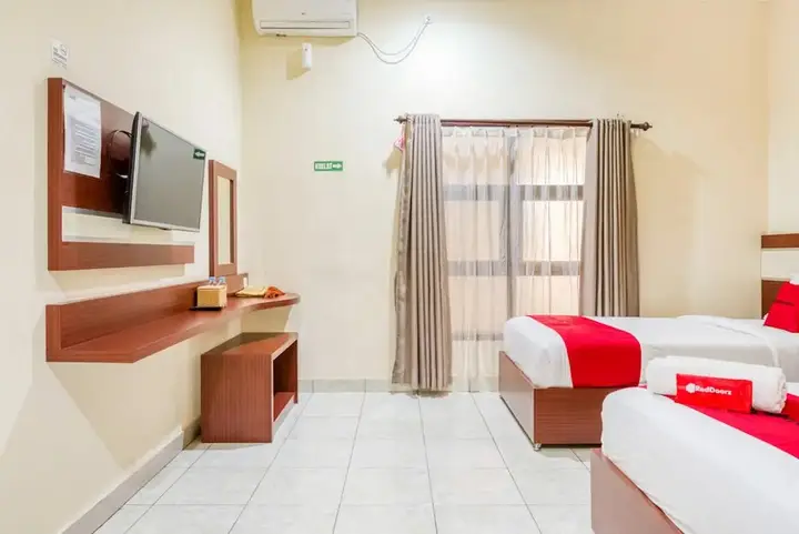 Hasanah Guest House Gajayana by Reddoorz — фото 4