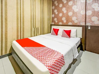 Палу: OYO 90866 Wilven Guest House Syariah