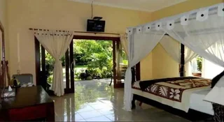 Бунутан: Bali Bhuana Beach Cottages