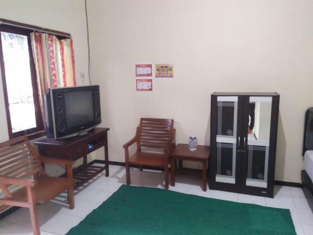 Мелайя: Penginapan Hotel Mangir Asri