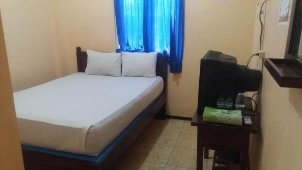Мелайя: Penginapan Hotel Mangir Asri