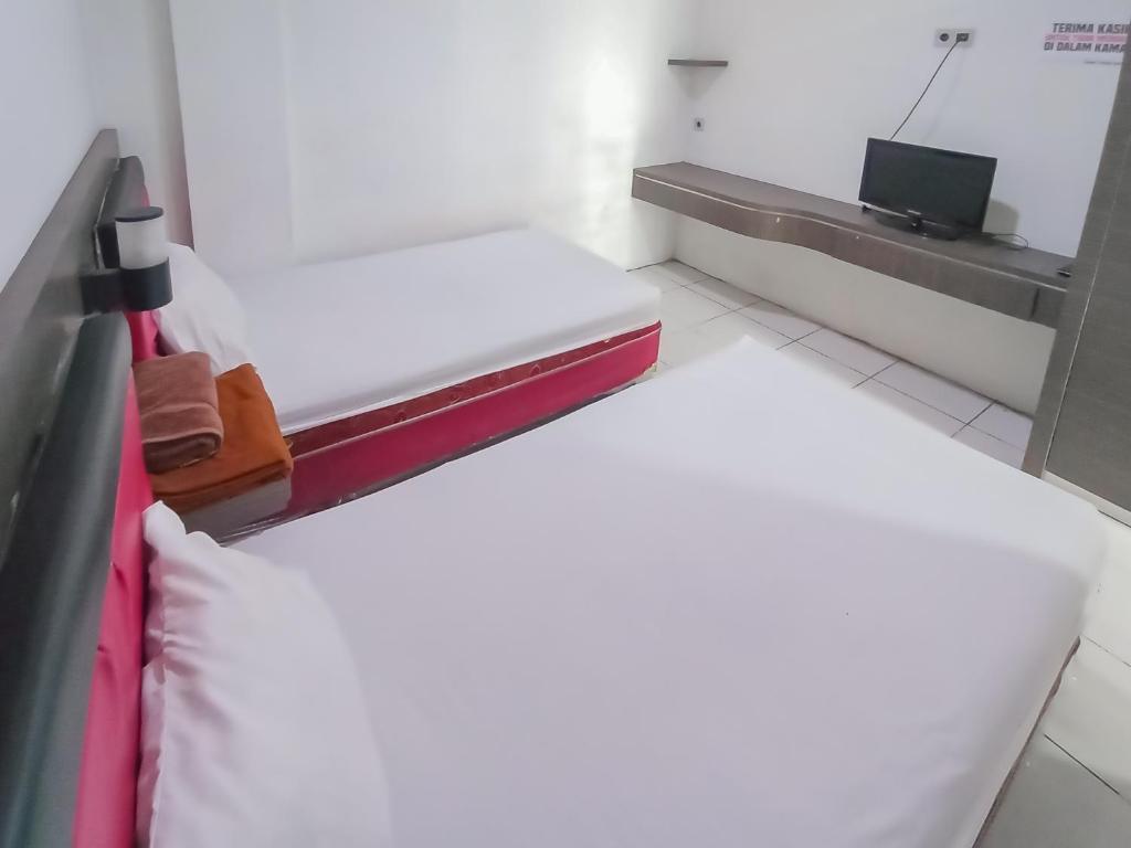 Банджанбару: OYO 3848 Kavana Syariah Homestay