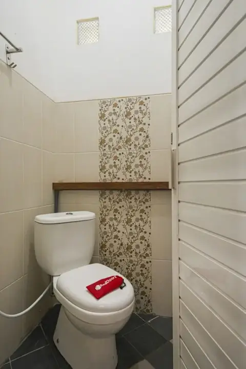 RedDoorz Syariah @ Tatasurya Guesthouse Malang — фото 3
