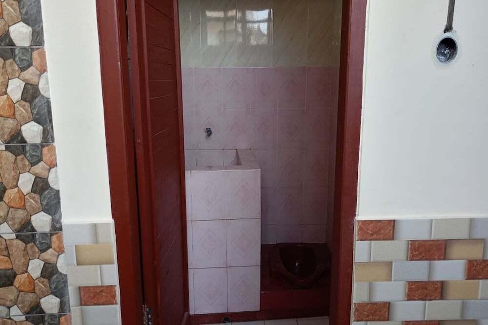 Маланг: SPOT ON 92743 Kost Elisabeth Syariah