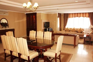 Медан: Travellers Suites