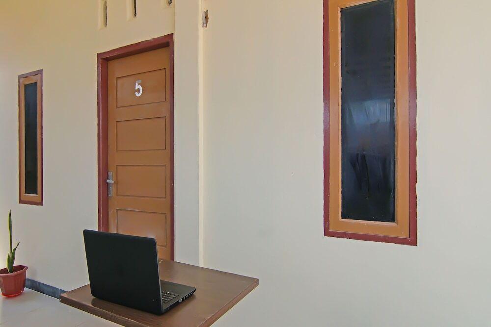 Пеканбару: SPOT ON 92570 Putri Guest House Syariah Near SPBU Rimbo Panjang