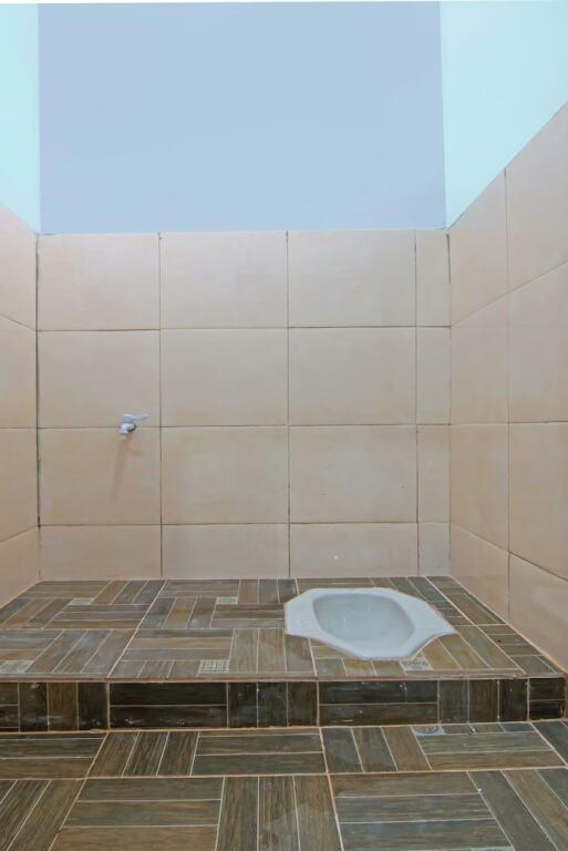 Пеканбару: SPOT ON 92570 Putri Guest House Syariah Near SPBU Rimbo Panjang