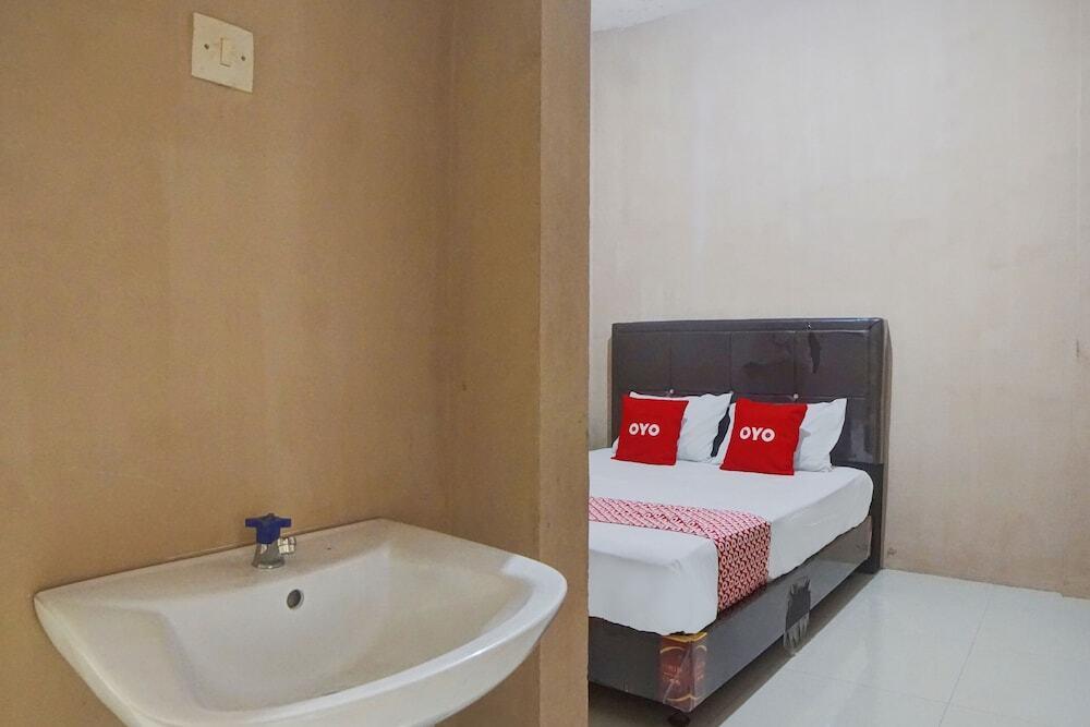 OYO 92826 Penginapan Syariah Faster Inn — фото 5