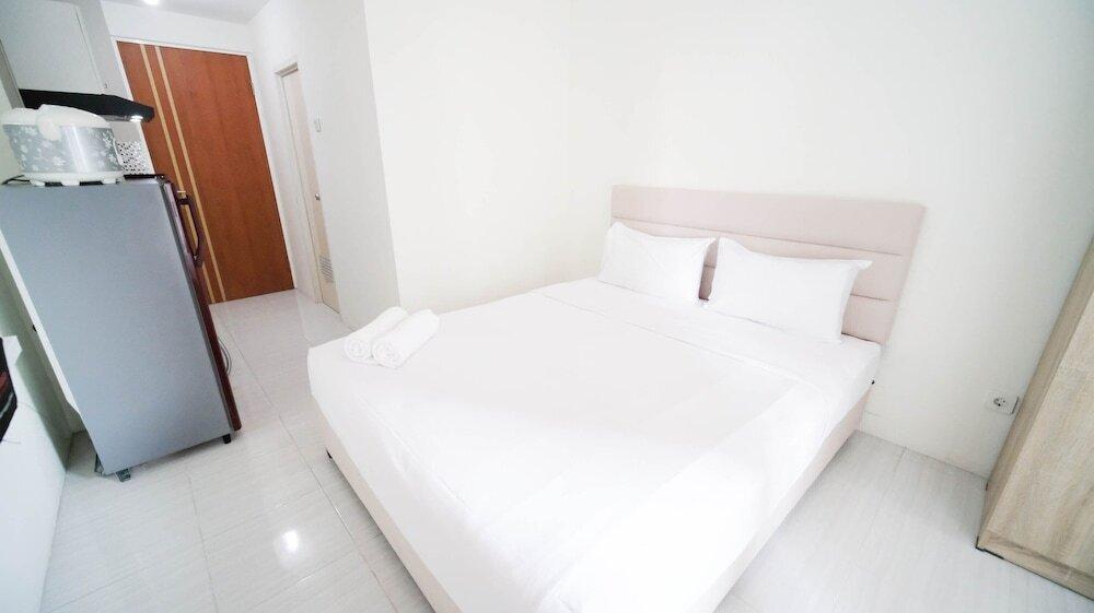 Сурабая: Compact And Tidy Studio At Puncak Dharmahusada Apartment