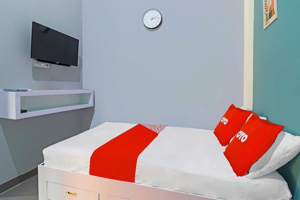 Джамби: OYO Life 92691 Mc Kost Syariah