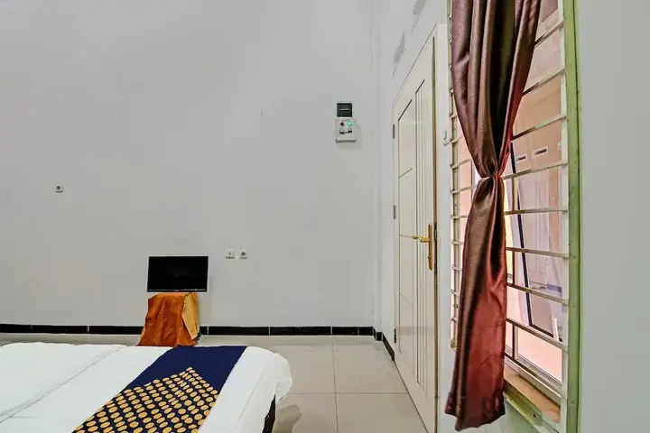 Пеканбару: SPOT ON 92255 Lucky Guesthouse