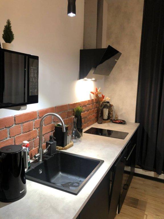 Сярьги: Апартаменты Охта Парк Ohta Loft Apartments с террасой